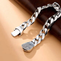 Curb Link Chain Bracelet with Cross Clasp